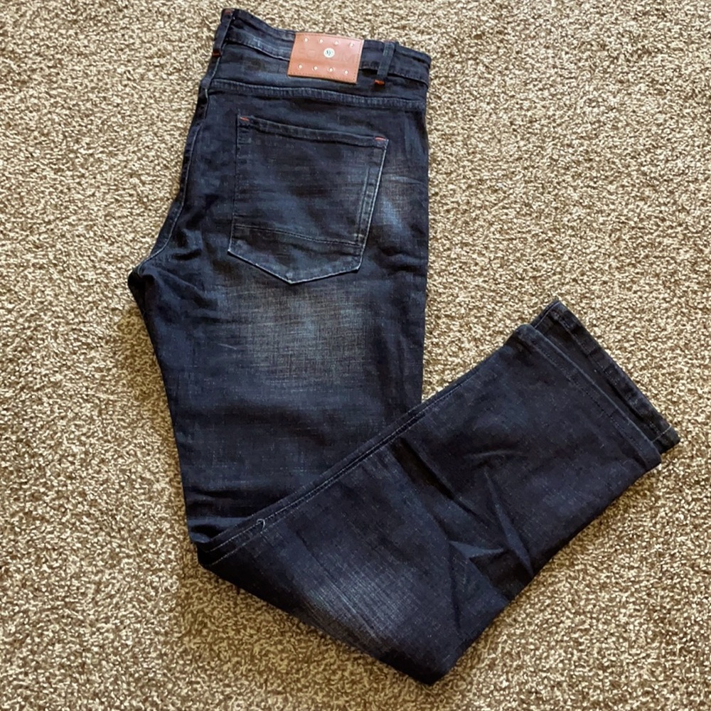 Dark forum jean with clear patches